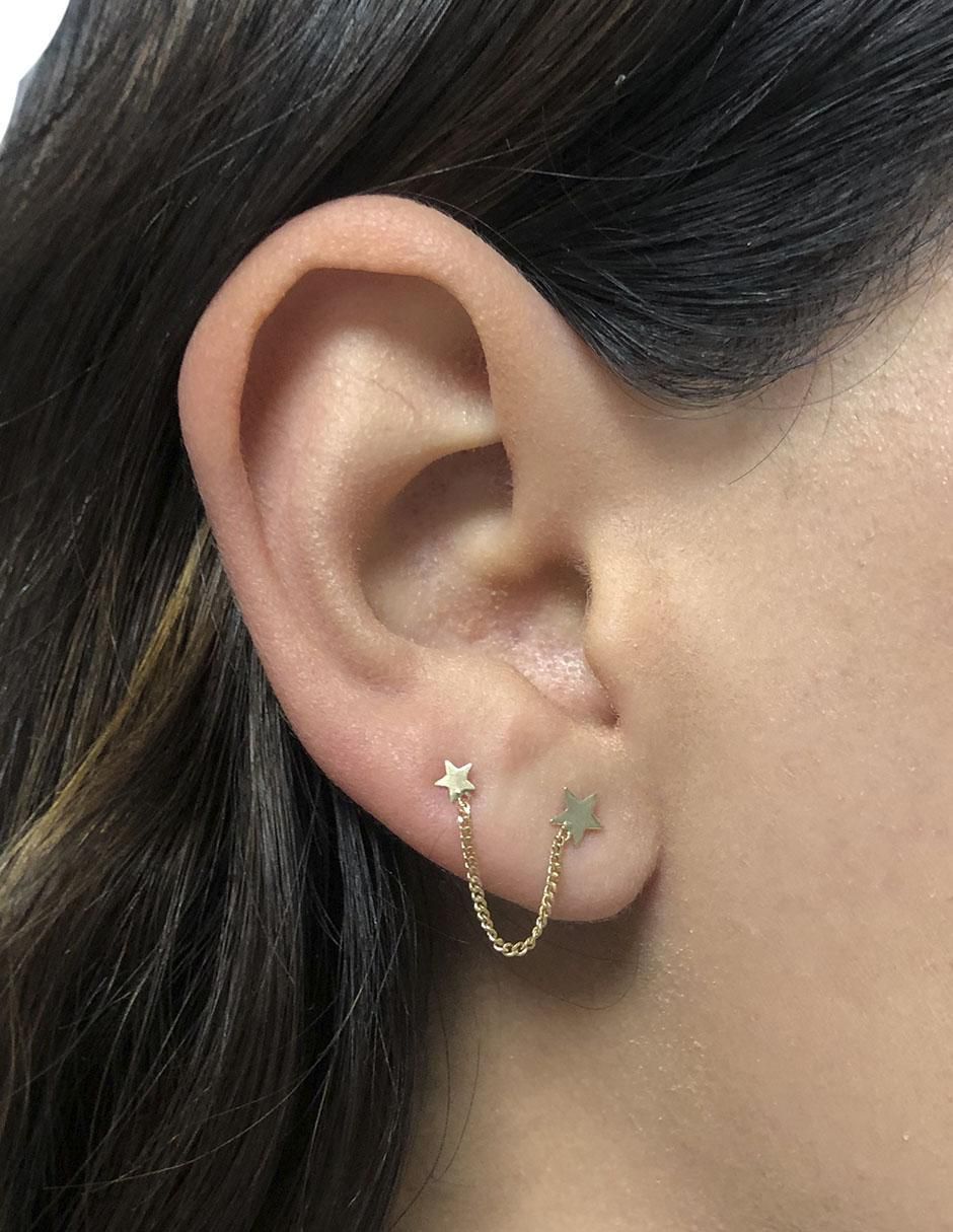 Piercing de estrella de oro con acabado brillante 3