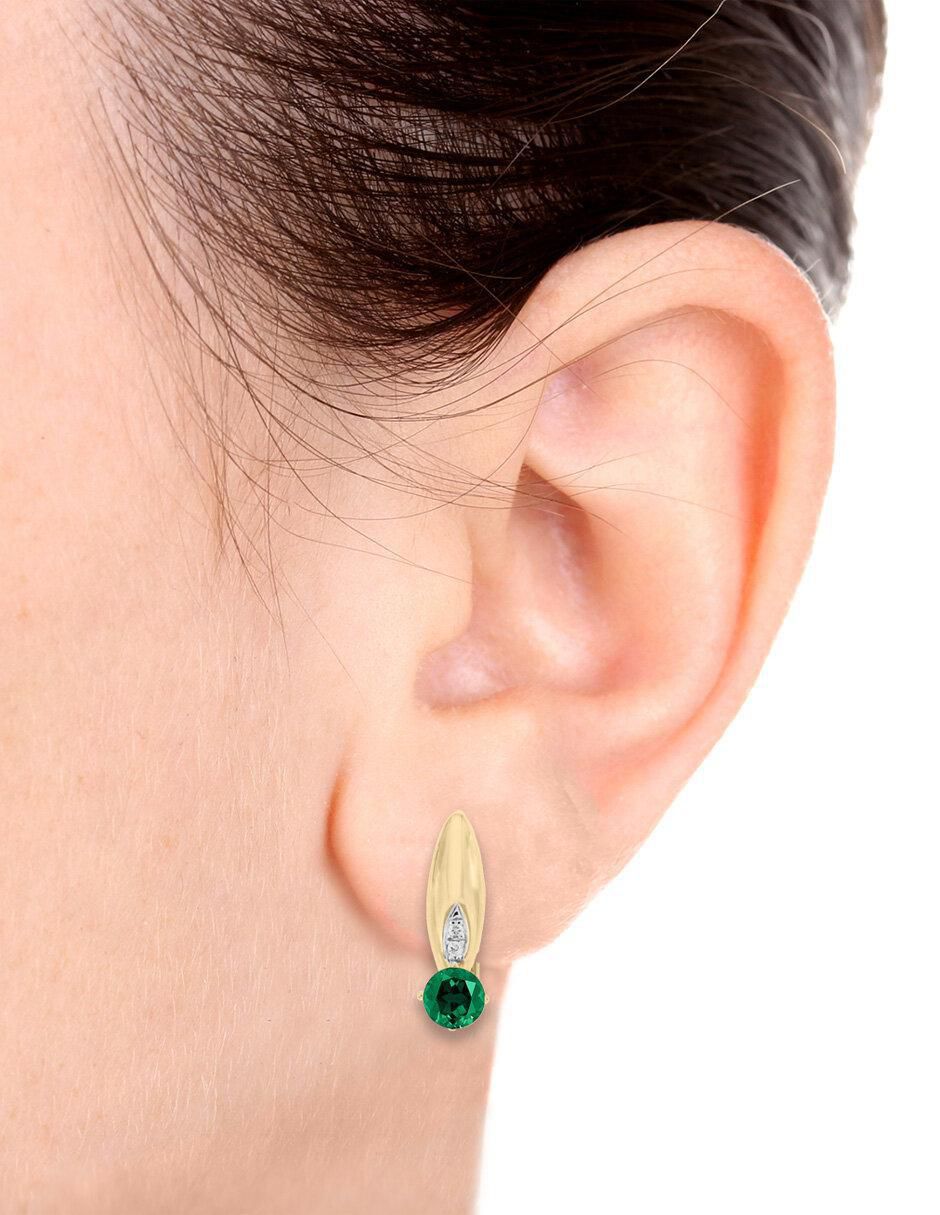 Aretes de oro 14 K con acabado brillante esmeralda y diamante 2