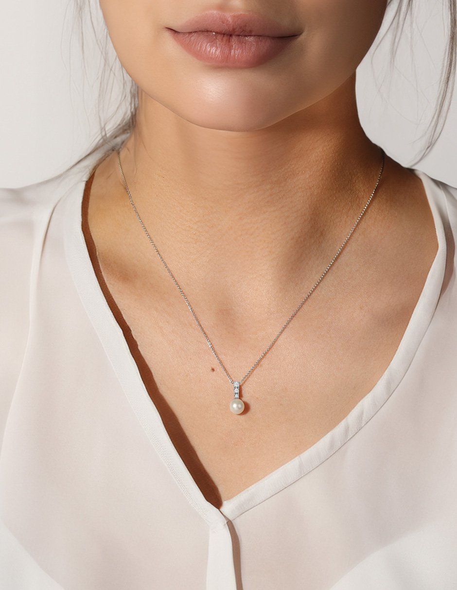 Colgante y dije redondo de oro 14 K