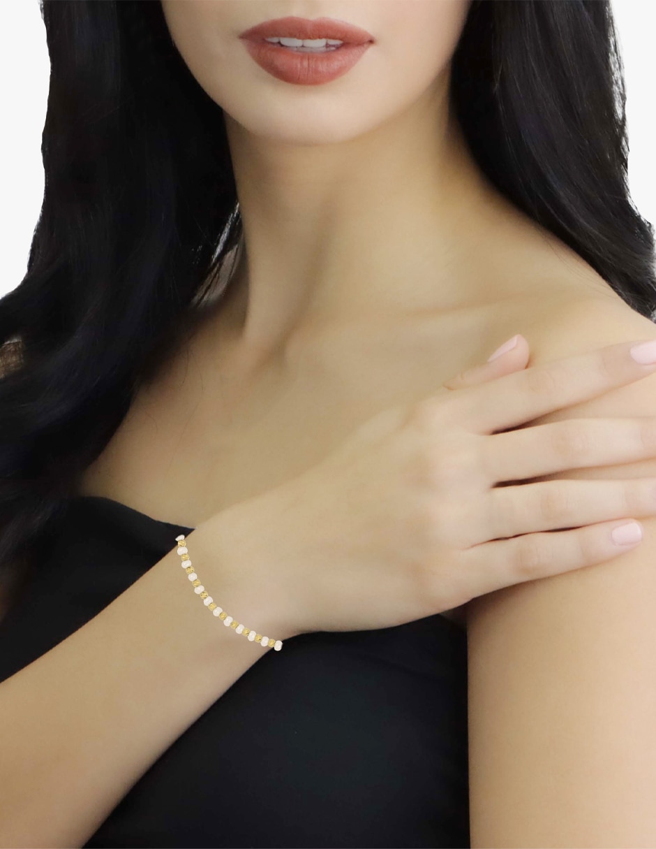 Pulsera de oro amarillo con perla 14 k con acabado brillante