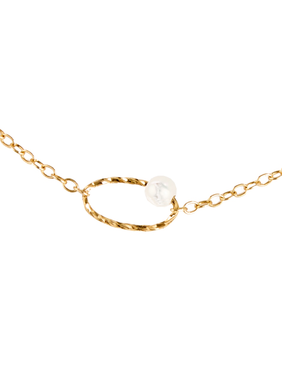 Pulsera de oro con perla 14 K acabado pulido 2