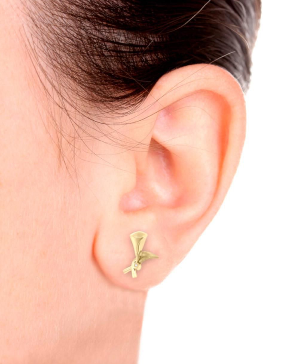 Aretes de flor de oro 14 K con acabado brillante diamante 2