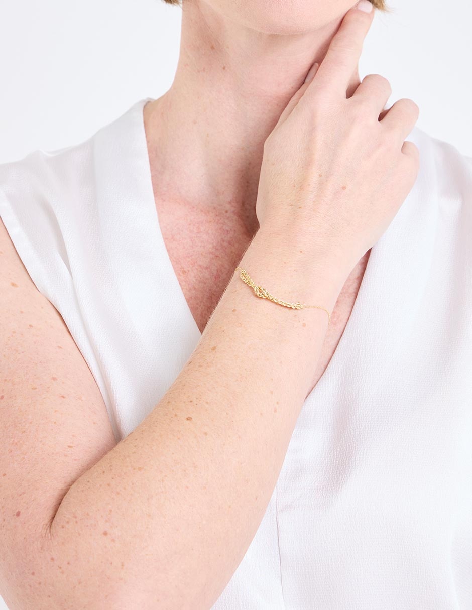 Pulsera de oro amarillo 14 k con acabado brillante Pulsera de oro amarillo 14 k con acabado brillante