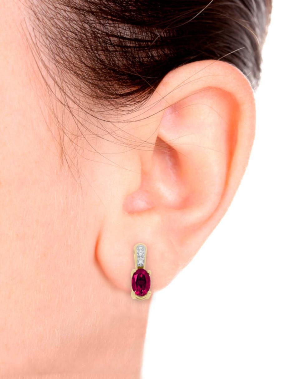 Aretes de oro 14 K con acabado brillante rubí y diamante 2