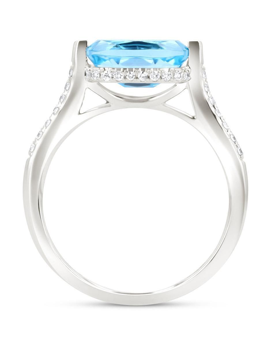 Anillo 14 k de oro blanco topacio y diamante brillante