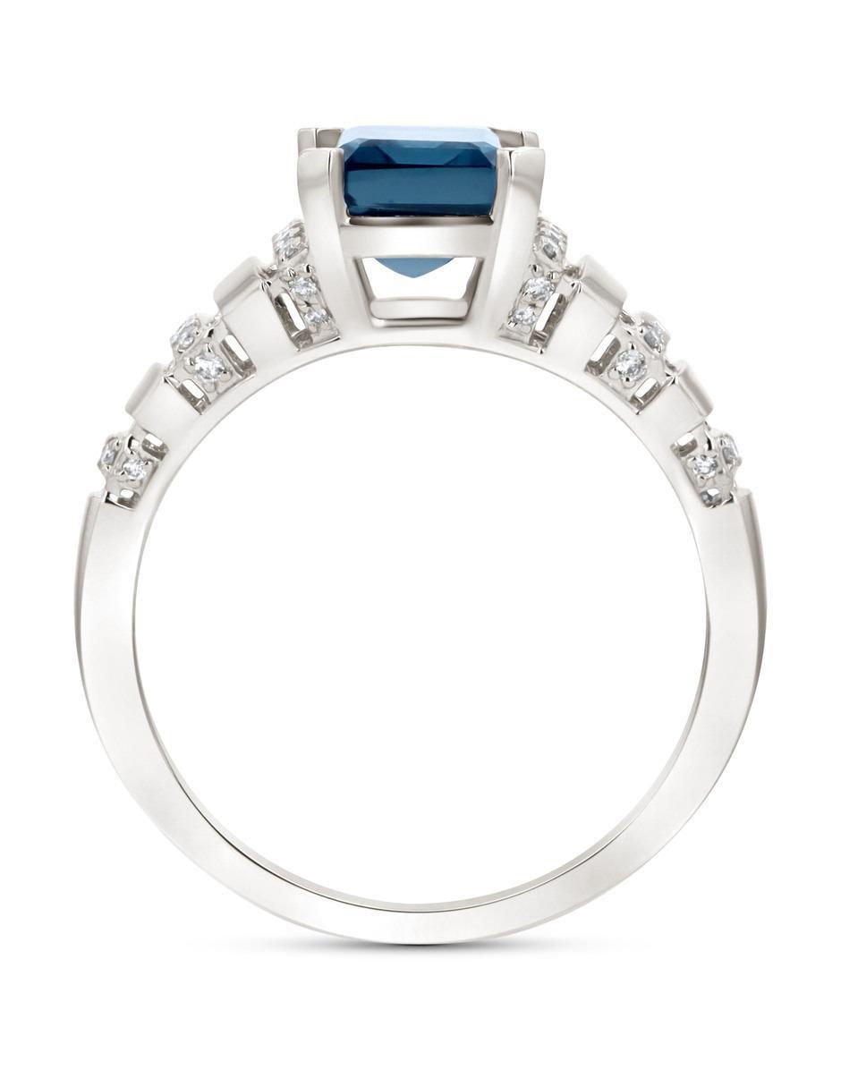 Anillo 14 k de oro blanco topacio y diamante brillante