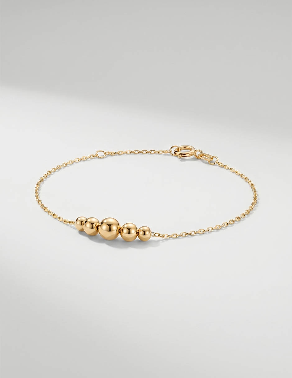 Pulsera de oro amarillo 14 K con acabado brillante