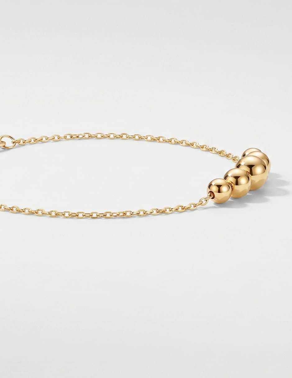 Pulsera Lusso de oro amarillo 14 K con acabado brillante