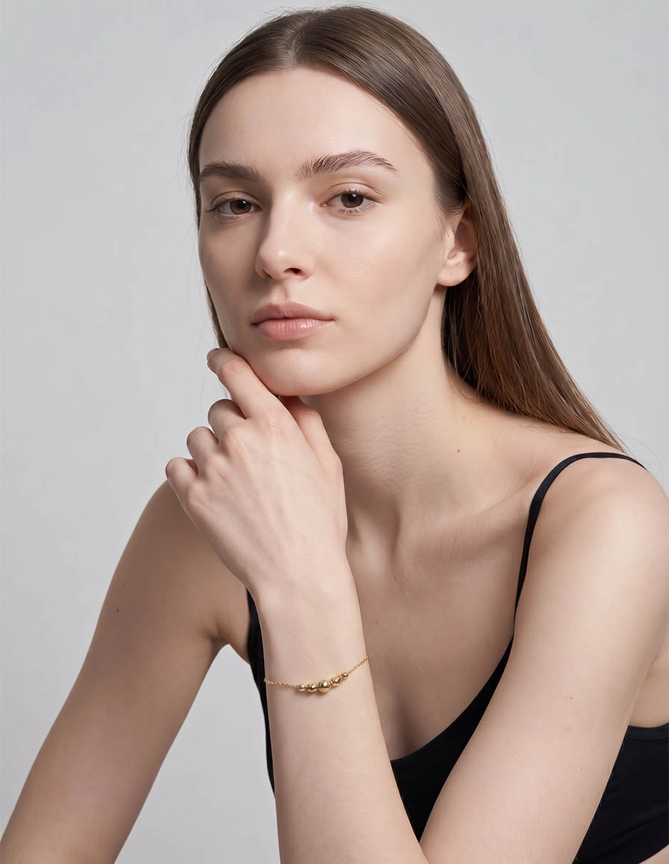Pulsera Lusso de oro amarillo 14 K con acabado brillante