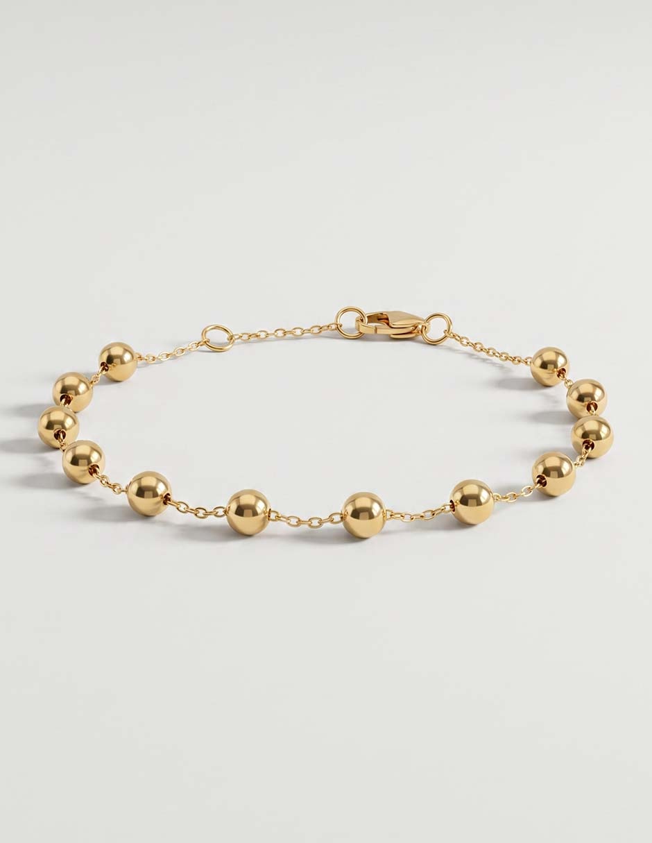 Pulsera de oro amarillo 14 K con acabado pulido 1