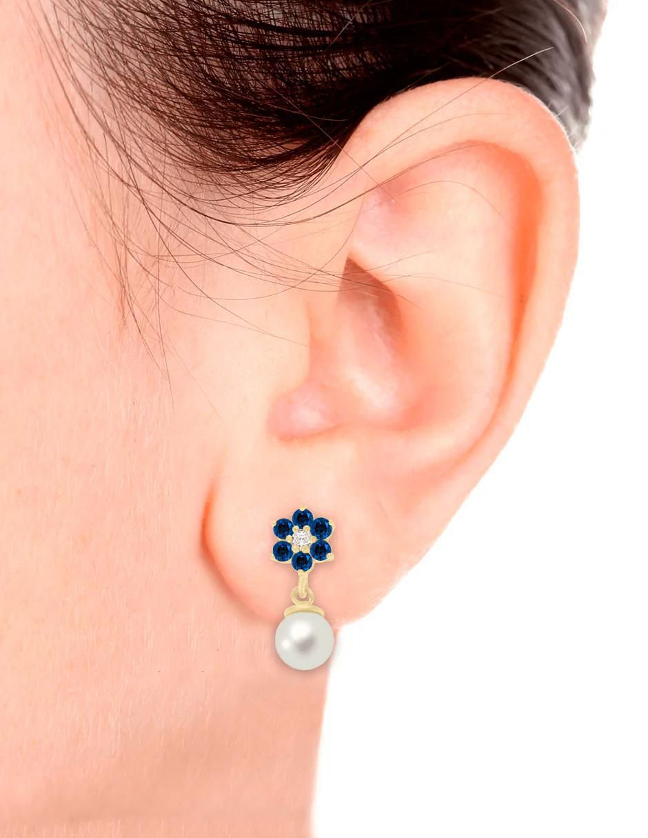 Aretes cortos de flor Fascinare Oria de oro 14 K con acabado brillante zafiro y perla
